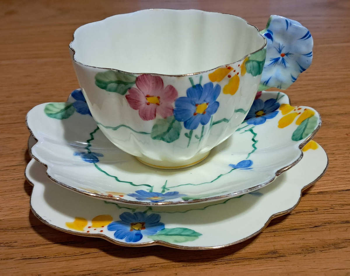 Hand painted Paragon tea trios and plate