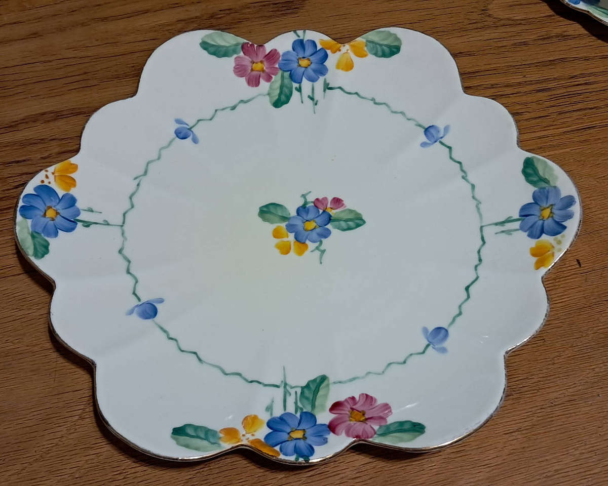 Hand painted Paragon tea trios and plate