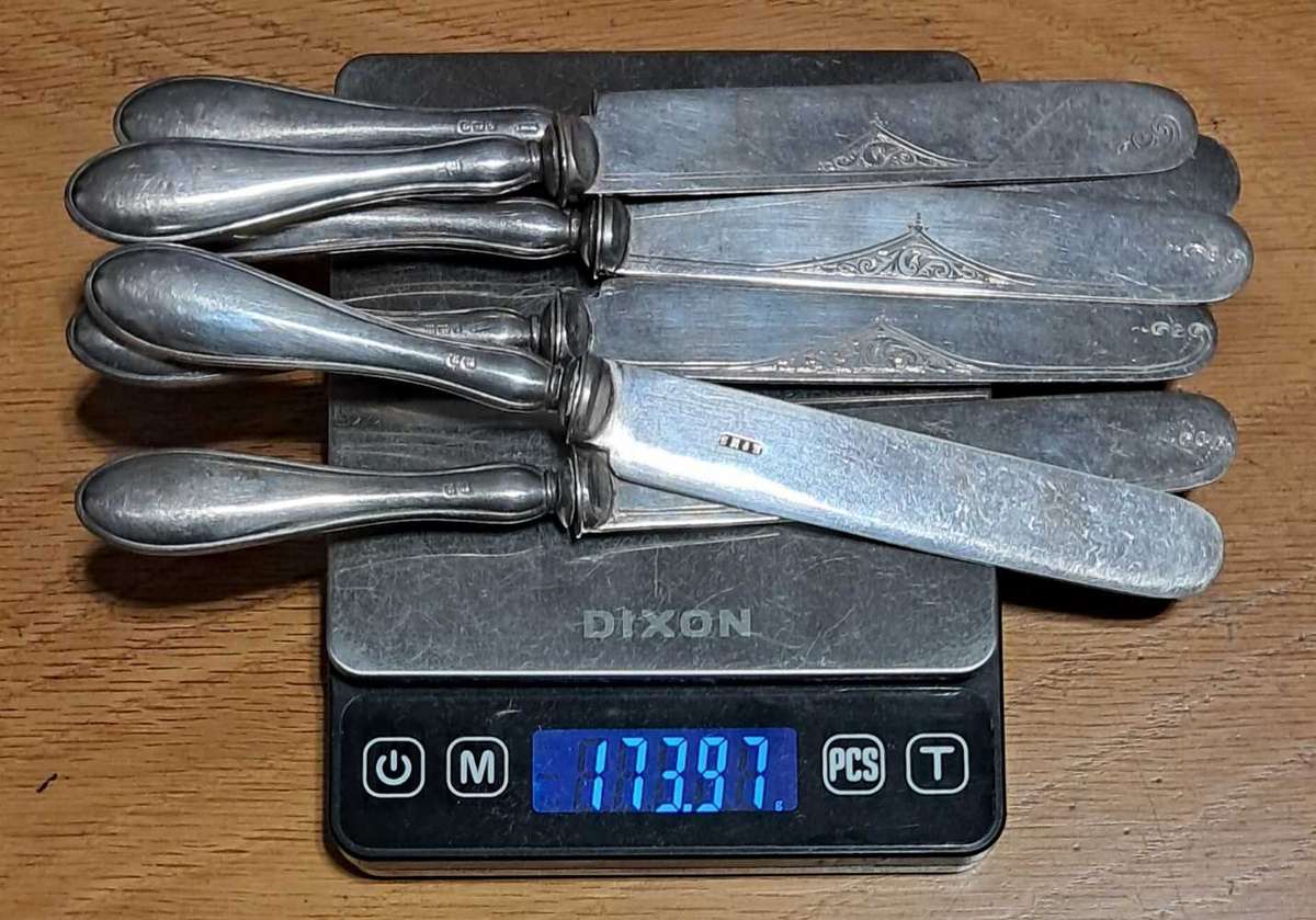 6 silver handled knives