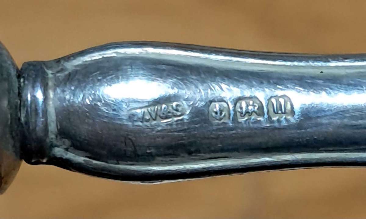 6 silver handled knives