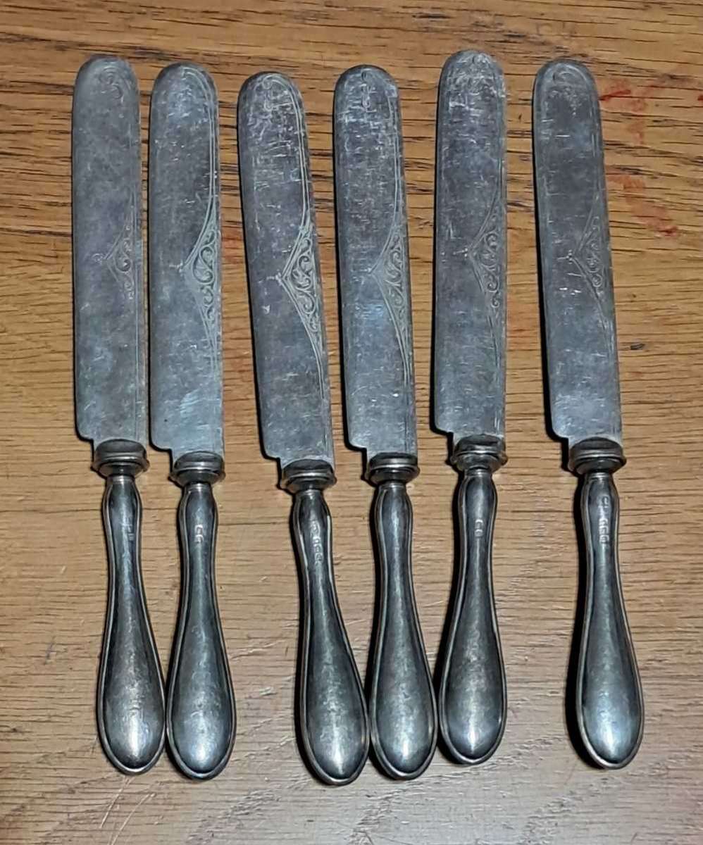 6 silver handled knives