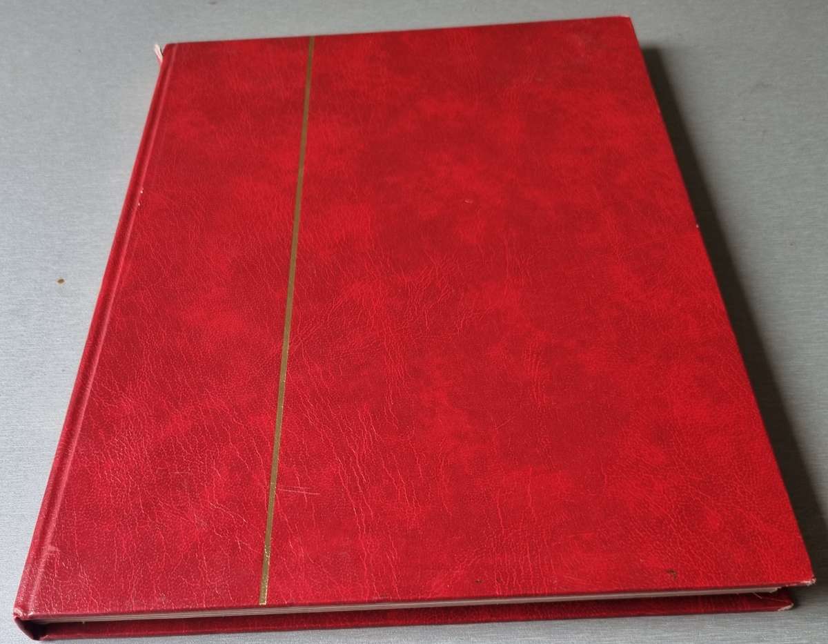 RED ALBUM 2ND HAND WITH MIXED WORLD STAMPS (MOSTLY USED). AS PER IMAGES. NB: PLEASE READ BELOW!!