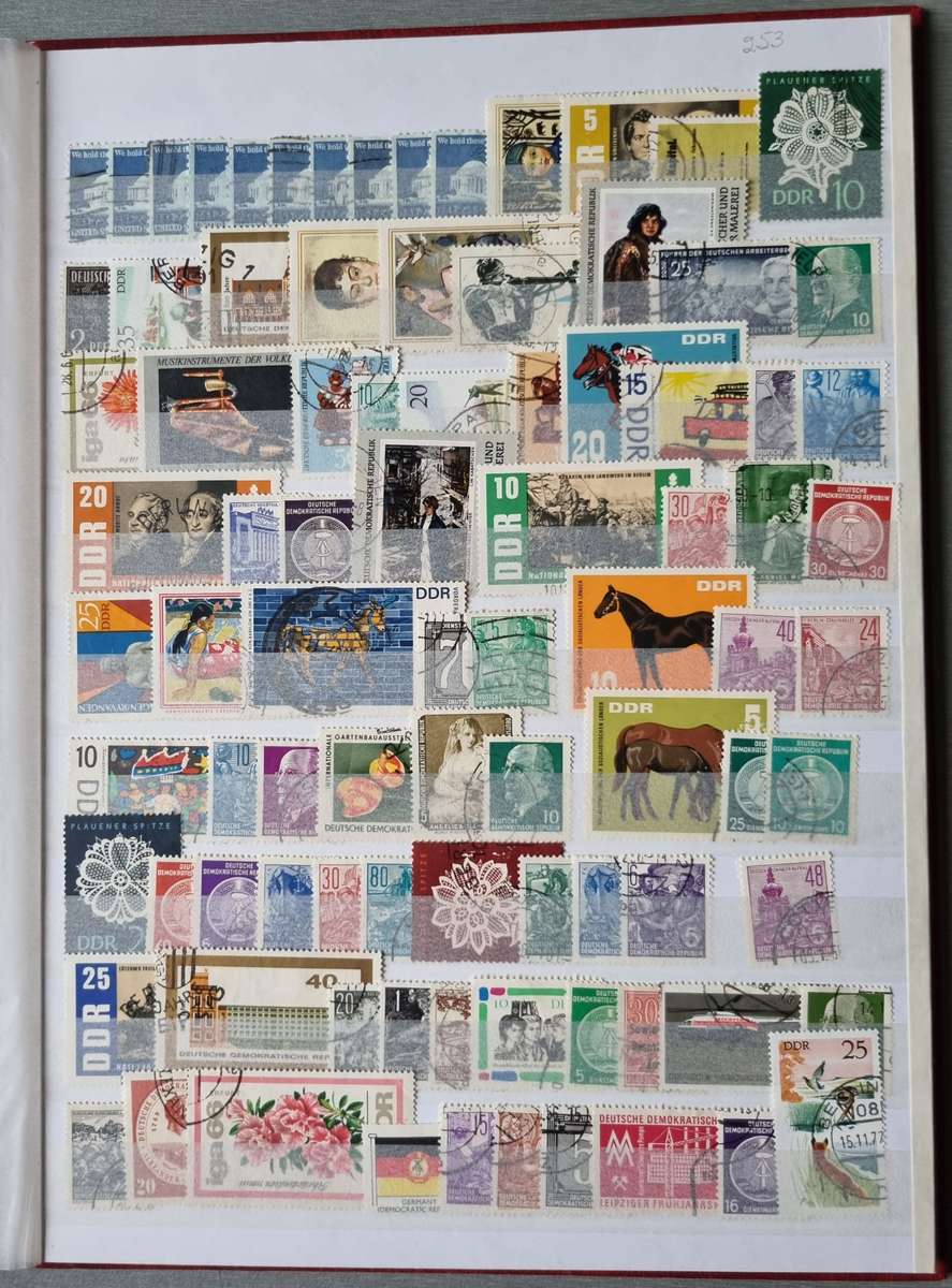 RED ALBUM 2ND HAND WITH MIXED WORLD STAMPS (MOSTLY USED). AS PER IMAGES. NB: PLEASE READ BELOW!!