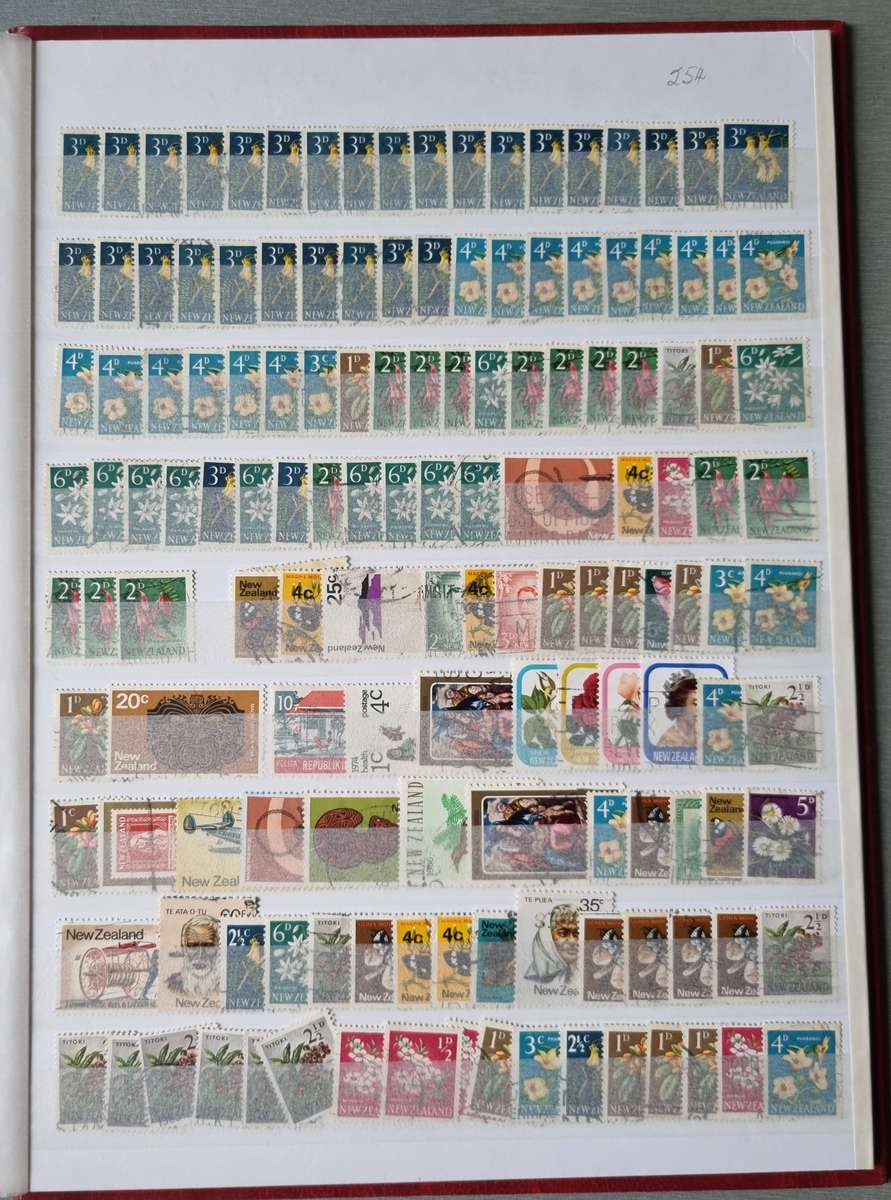 RED ALBUM 2ND HAND WITH MIXED WORLD STAMPS (MOSTLY USED). AS PER IMAGES. NB: PLEASE READ BELOW!!