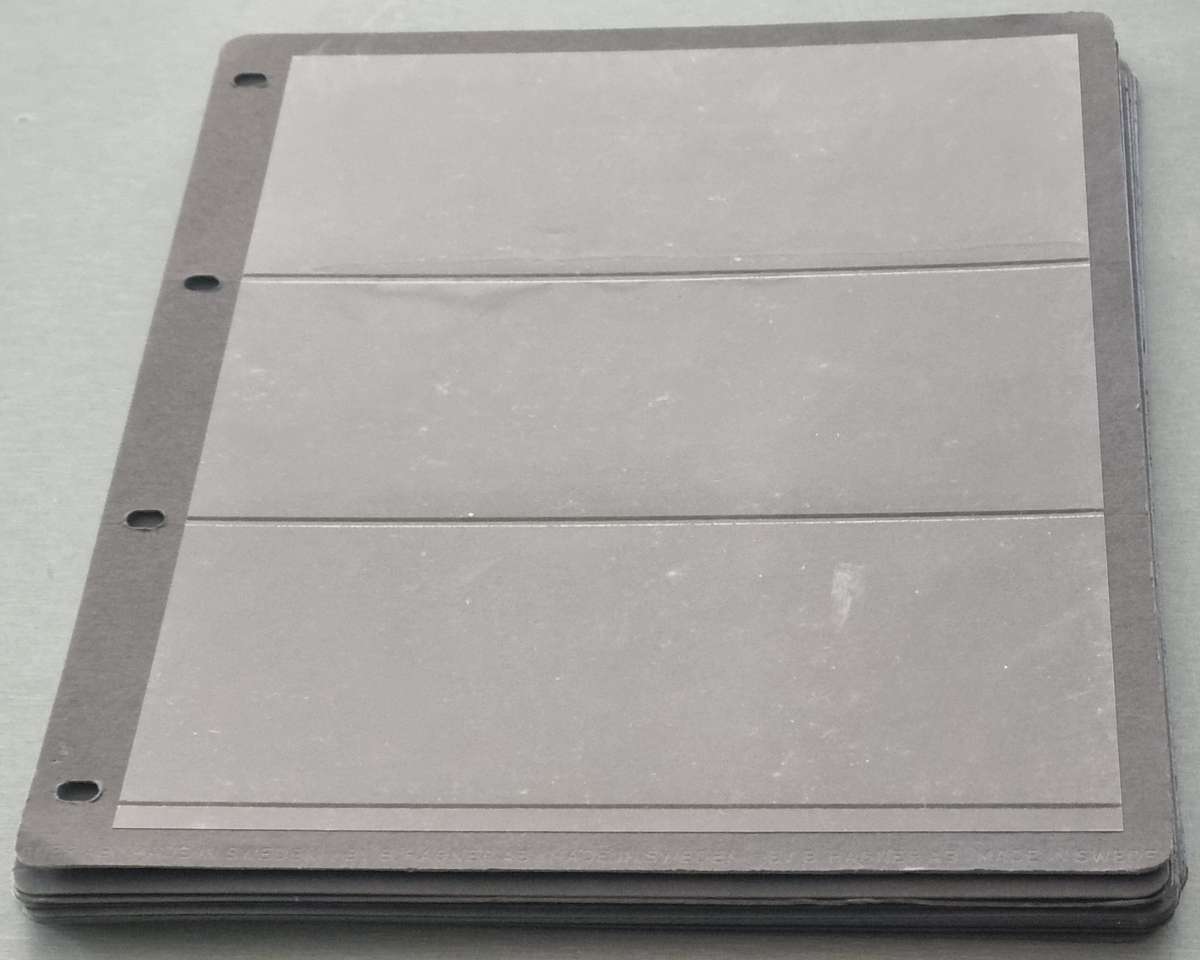 BLACK STOCK PAGES (X22). ONE SIDED. THREE POCKETS. AS PER IMAGE.