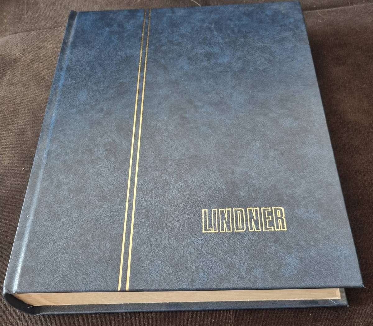 Linder album 2nd hand (32 white pages/64 sides) in good nick  some pages with markings etc  read.