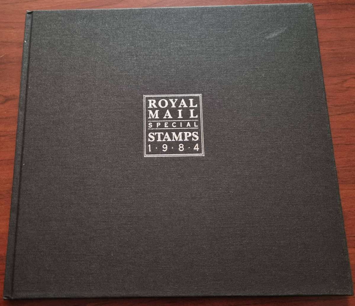 GB 1984 post office yearbook in 24 page hardbound book with slip case. SG1236/71 CV GBP 85.