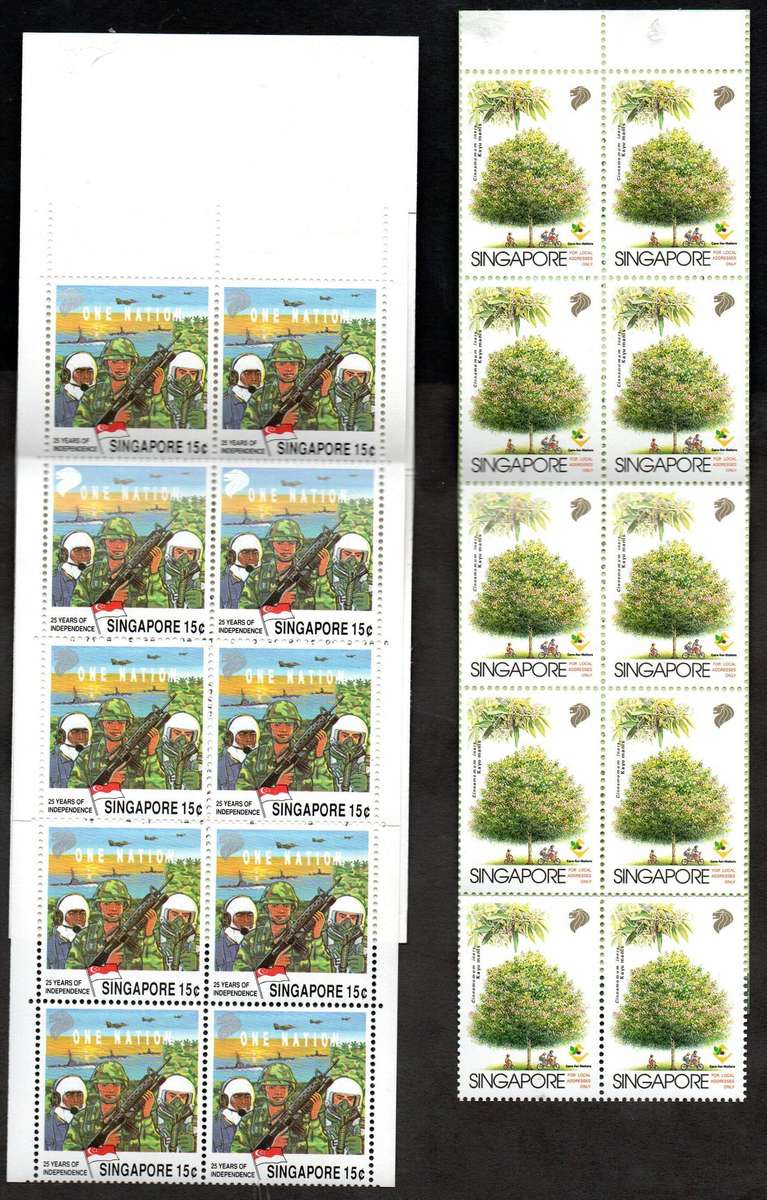 Singapore clearance of (x8) mint/self-adhesive booklets  as per scans  good value.