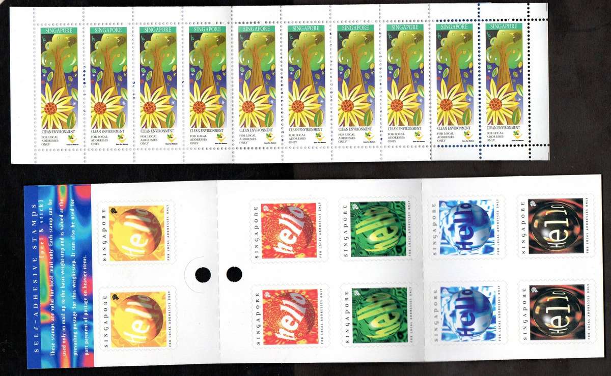 Singapore clearance of (x8) mint/self-adhesive booklets  as per scans  good value.