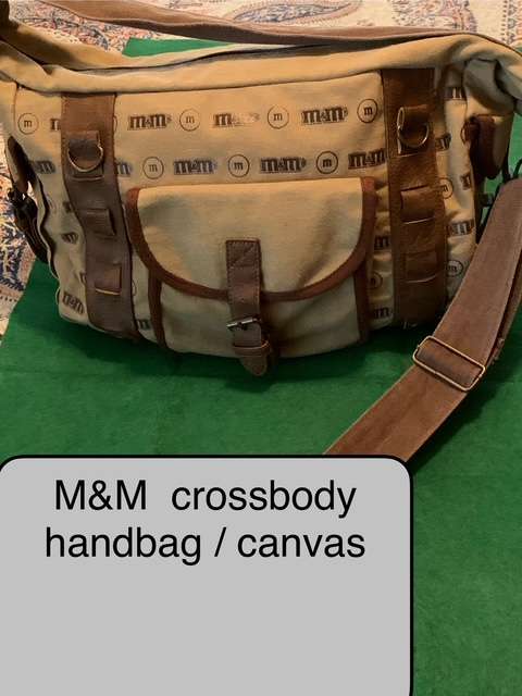 M&M CROSS BODY HANDBAG
