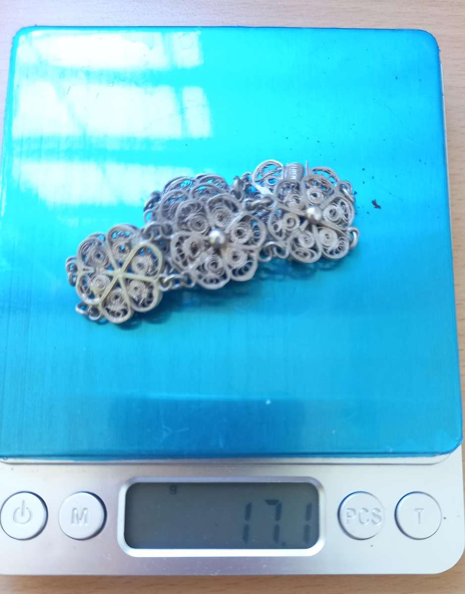 Vintage silver filigree bracelet with interesting clasp