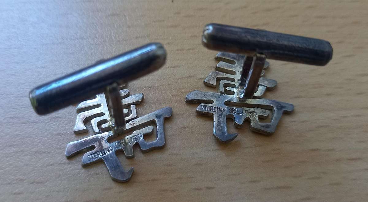 Silver cufflinks with Chinese symbol