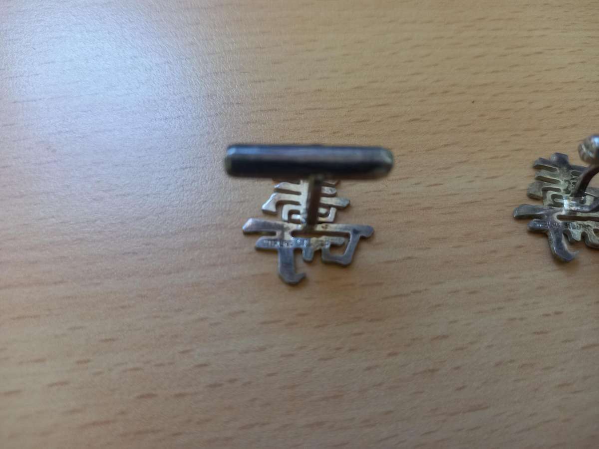 Silver cufflinks with Chinese symbol