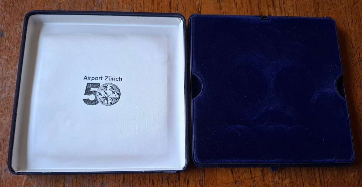 Set of 8 medallions commemorating 50 years of Zurich airport