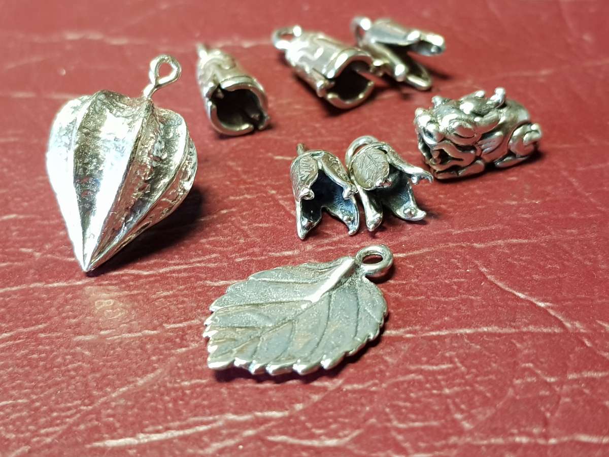 A Lot Of 8 Sterling Silver Charms - [10,3 g]