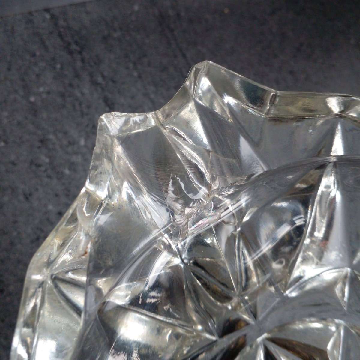 Vintage heavy crystal glass ashtray with an ornate brass stand.