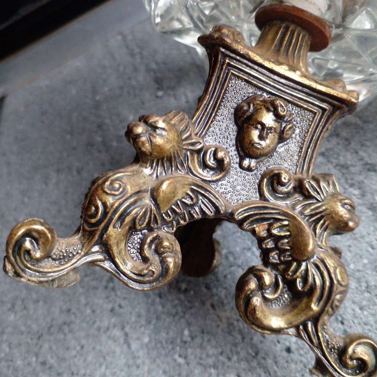 Vintage heavy crystal glass ashtray with an ornate brass stand.