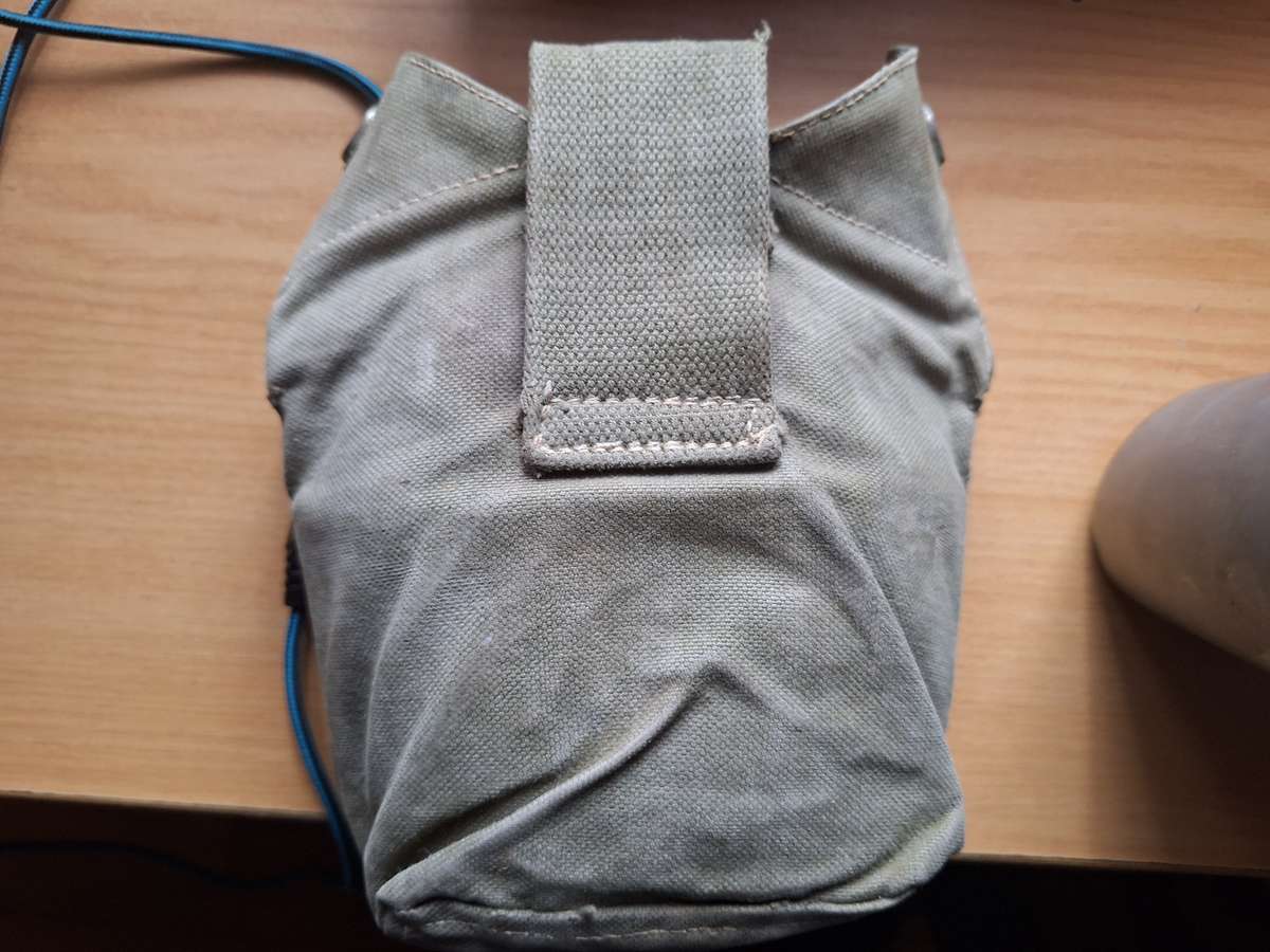 Army water bottle in pouch with bucket