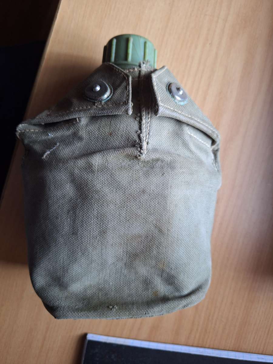 Army water bottle in pouch with bucket