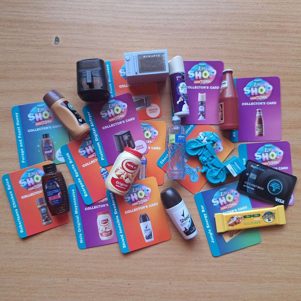 12 x checkers little shop goes xtra toys witkh cards