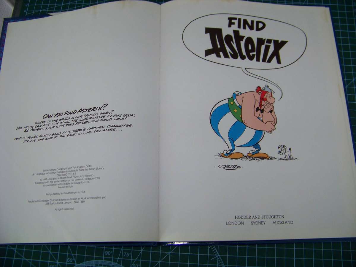 Asterix and Simpsons Hard cover Comic Books