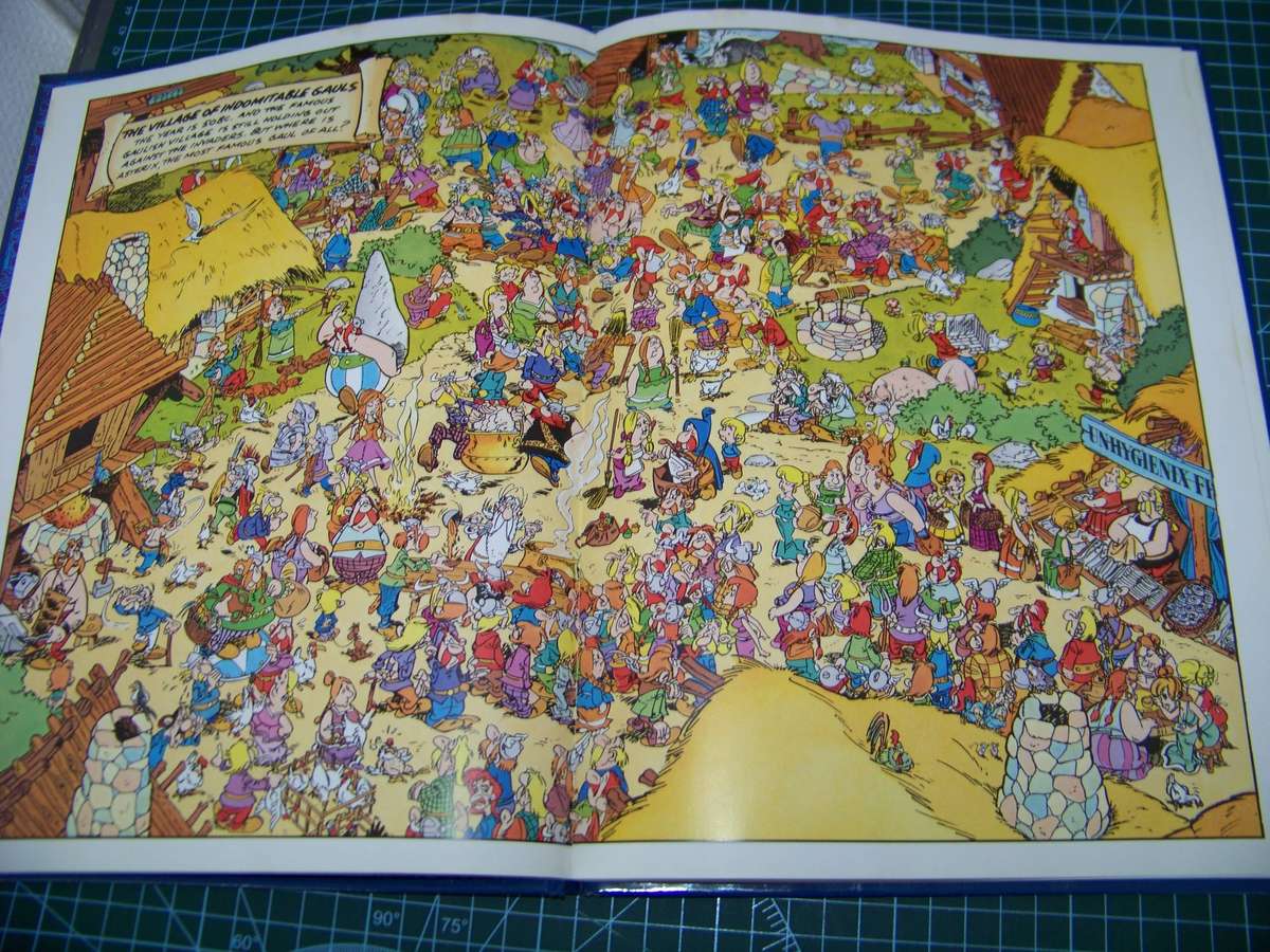 Asterix and Simpsons Hard cover Comic Books