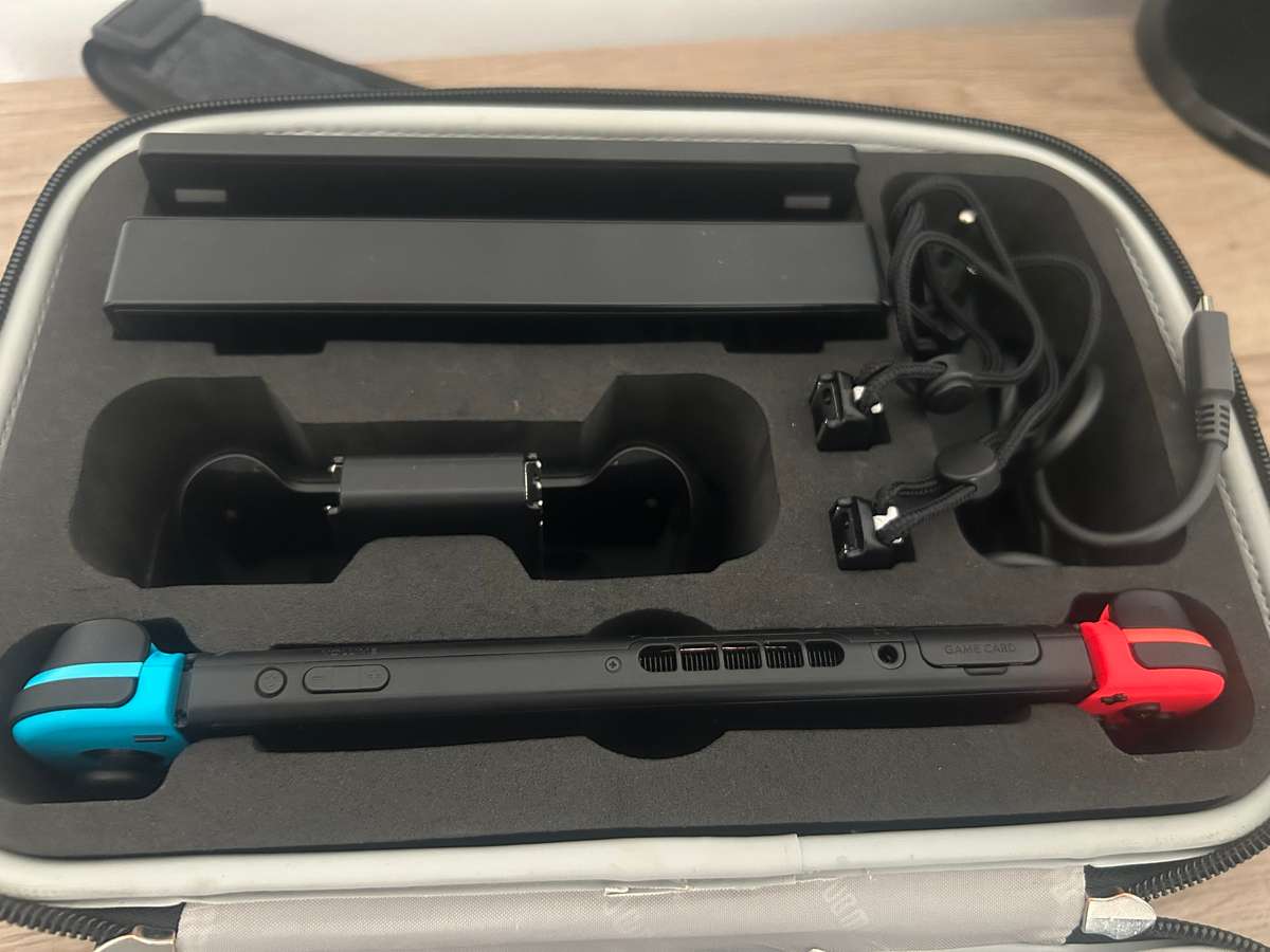 Nintendo Switch V1 with original accessories & Carry bag