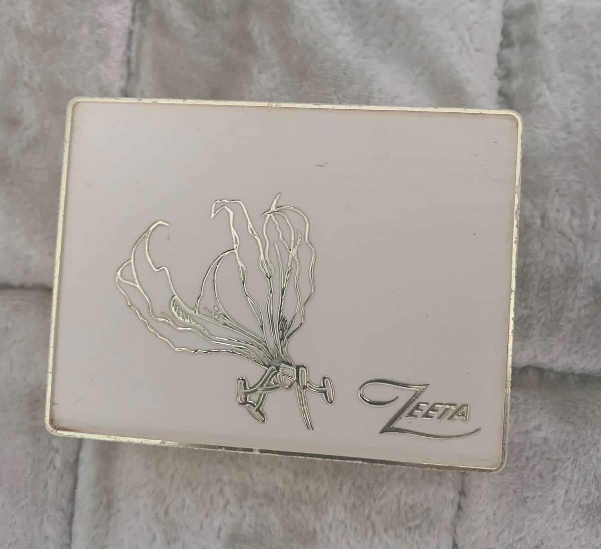 Flame lily brooch in box