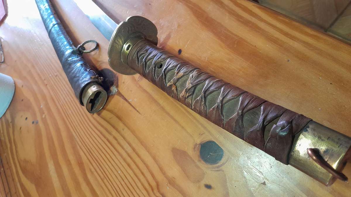 Japanese style WW2 soldier sword with leather wrapped scabbard