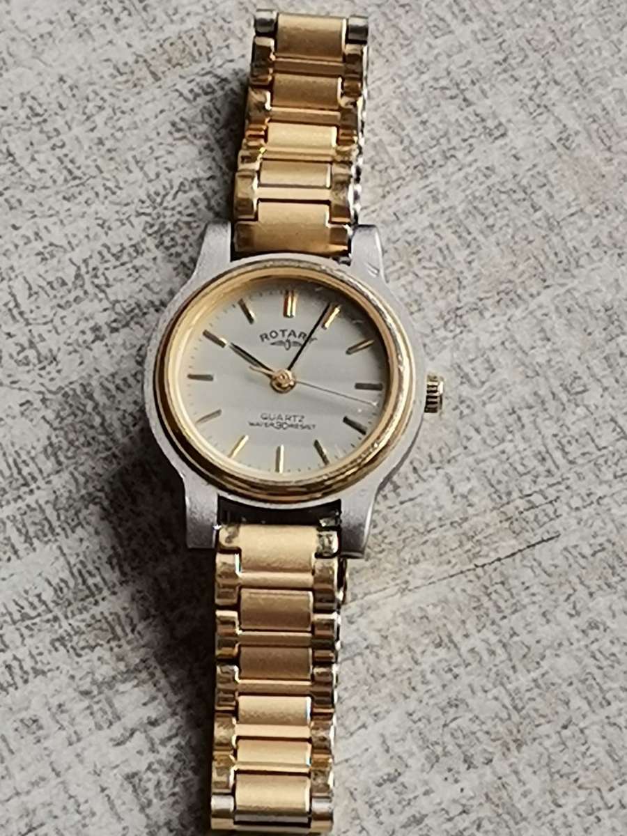LADIES ELEGANT ROTARY SWISS MADE GOLD WATCH IN EXCELLENT WORKING CONDITION