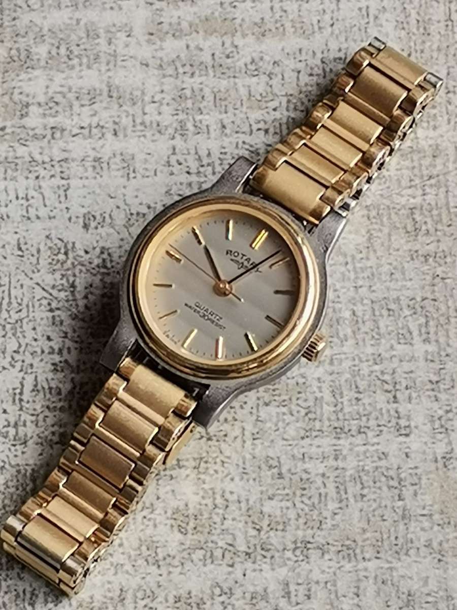 LADIES ELEGANT ROTARY SWISS MADE GOLD WATCH IN EXCELLENT WORKING CONDITION