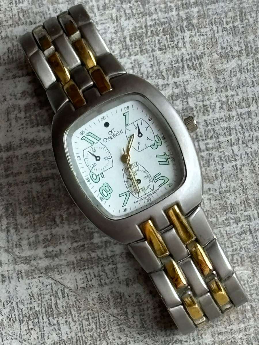 MENS OCEANIC STAINLESS STEEL WATCH IN EXCELLENT WORKING CONDITION