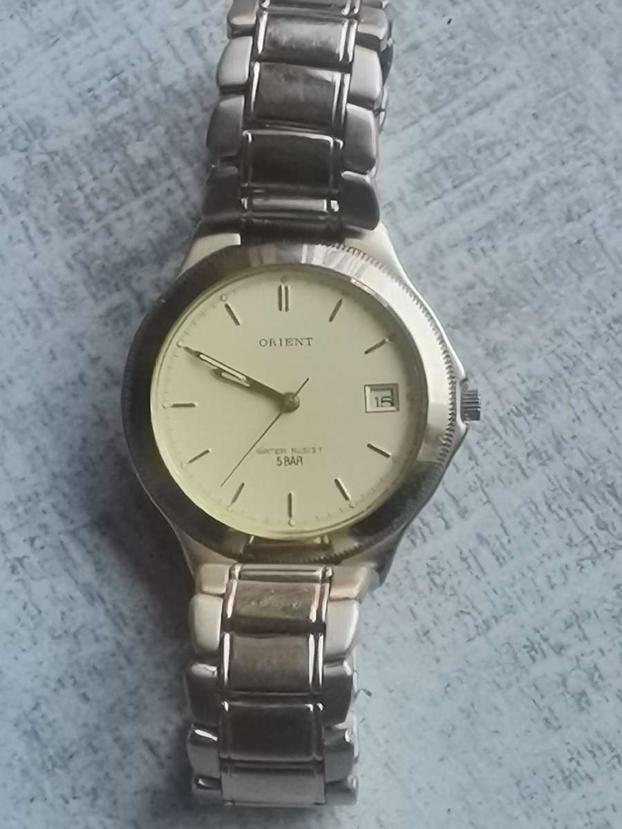 VINTAGE MENS ORIENT GOLD PLATED QUARTZ WATCH IN EXCELLENT WORKING CONDITION
