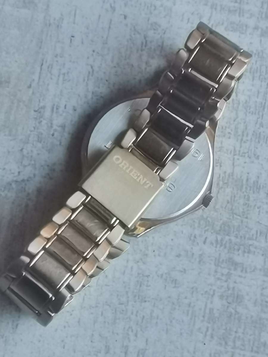 VINTAGE MENS ORIENT GOLD PLATED QUARTZ WATCH IN EXCELLENT WORKING CONDITION