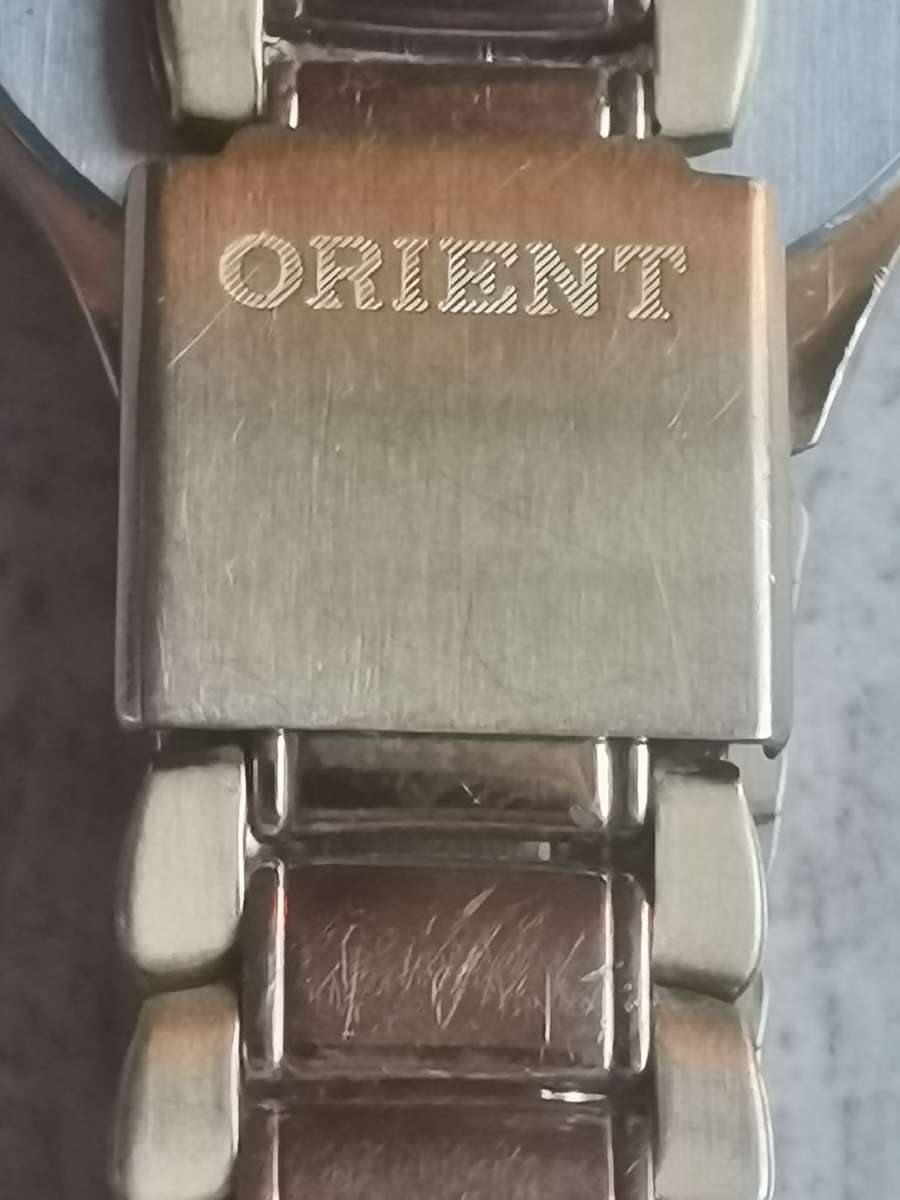 VINTAGE MENS ORIENT GOLD PLATED QUARTZ WATCH IN EXCELLENT WORKING CONDITION