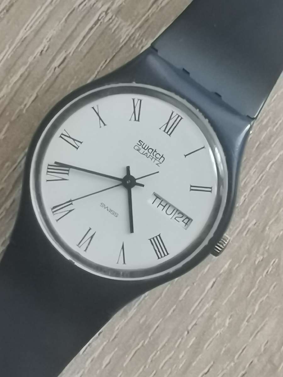 STUNNING SWATCH SWISS QUARTZ MENS WATCH WITH DAY/DATE FUNCTION IN EXCELLENT WORKING CONDITION