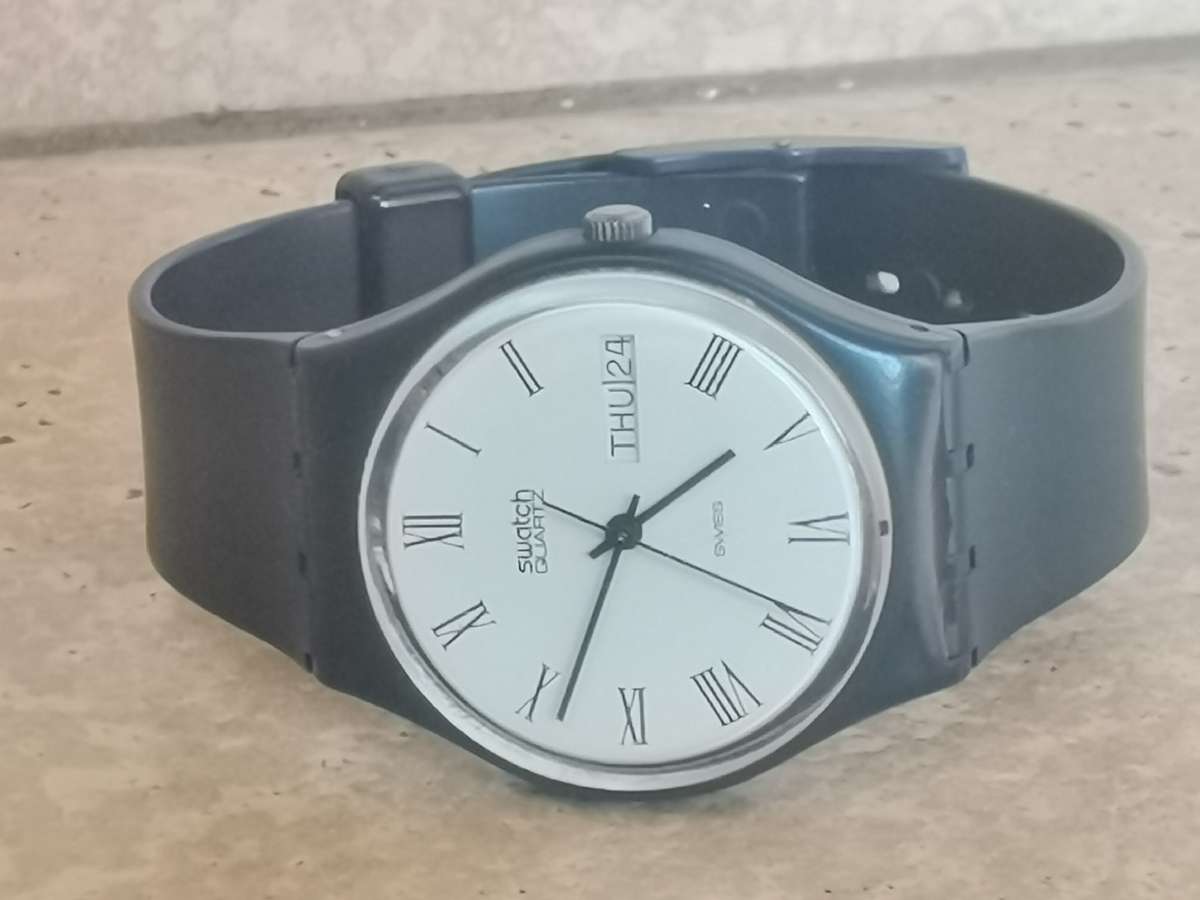 STUNNING SWATCH SWISS QUARTZ MENS WATCH WITH DAY/DATE FUNCTION IN EXCELLENT WORKING CONDITION
