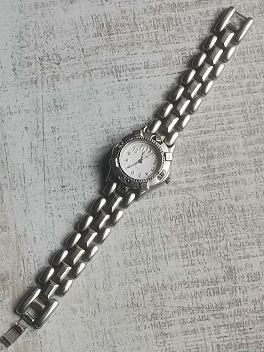 STUNNING AVANT STAINLESS STEEL LADIES WATCH WITH ROTATING BEZEL IN EXCELLENT WORKING CONDITION