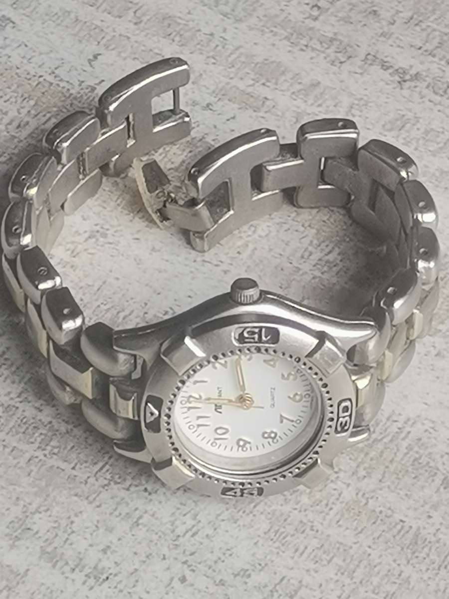 STUNNING AVANT STAINLESS STEEL LADIES WATCH WITH ROTATING BEZEL IN EXCELLENT WORKING CONDITION