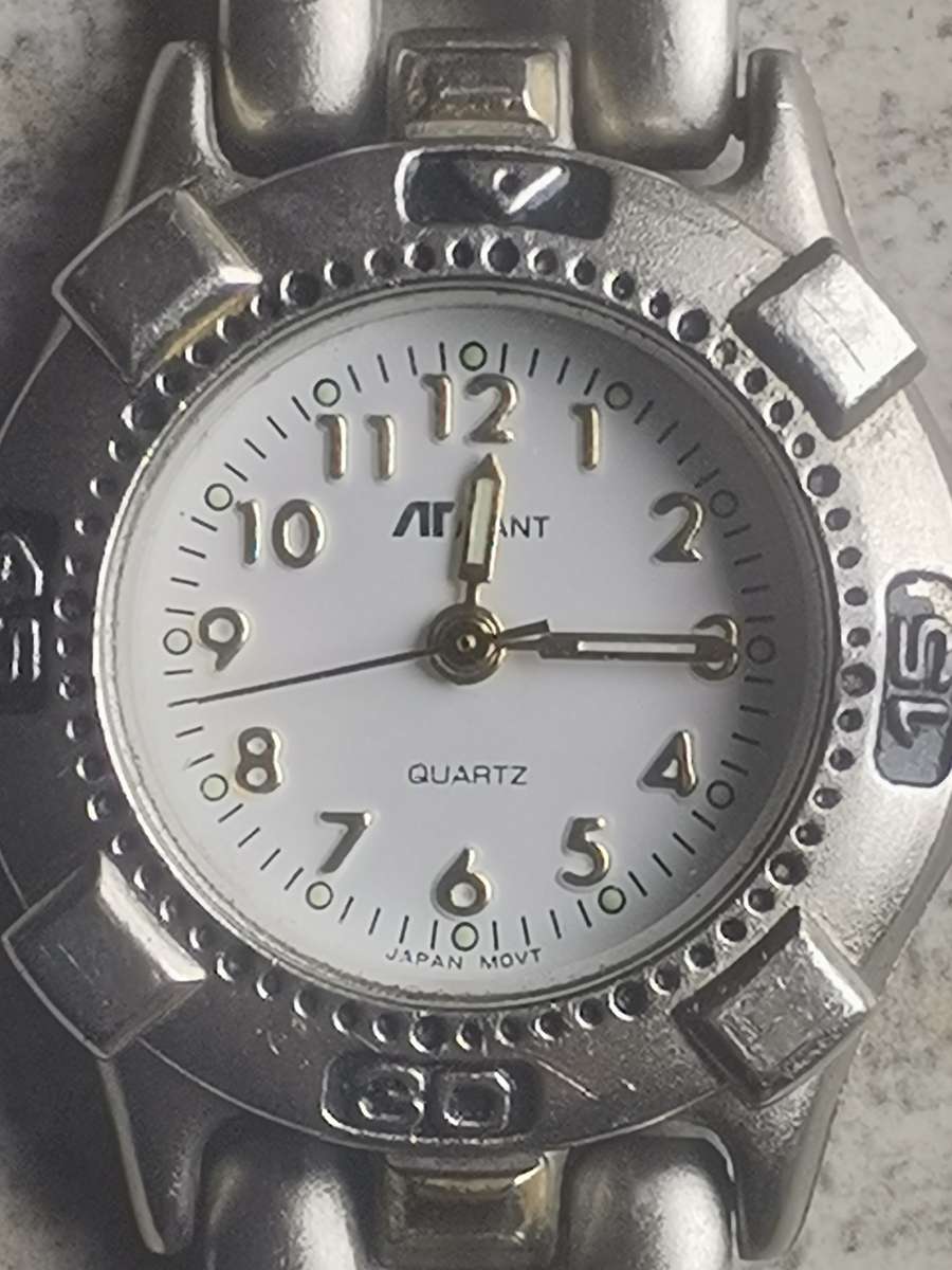 STUNNING AVANT STAINLESS STEEL LADIES WATCH WITH ROTATING BEZEL IN EXCELLENT WORKING CONDITION
