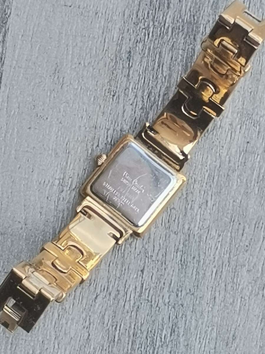 LADIES STUNNING PIERRE CARDIN SWISS MADE GOLD WATCH IN EXCELLENT WORKING CONDITION