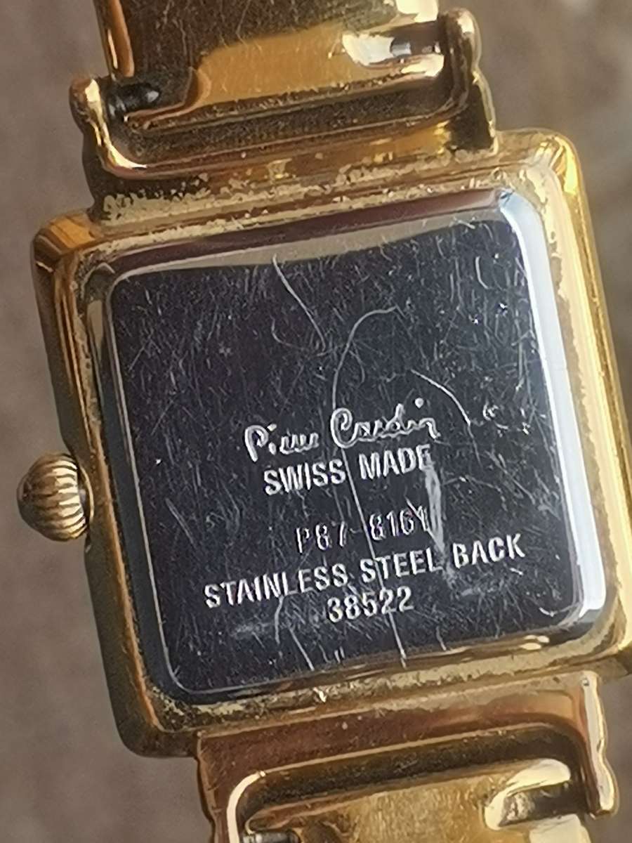 LADIES STUNNING PIERRE CARDIN SWISS MADE GOLD WATCH IN EXCELLENT WORKING CONDITION
