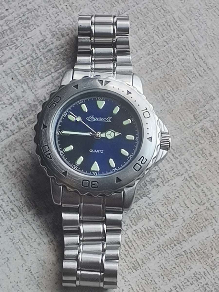 INGERSOL MENS WATCH WITH ROTATING BEZEL IN EXCELLENT WORKING CONDITION
