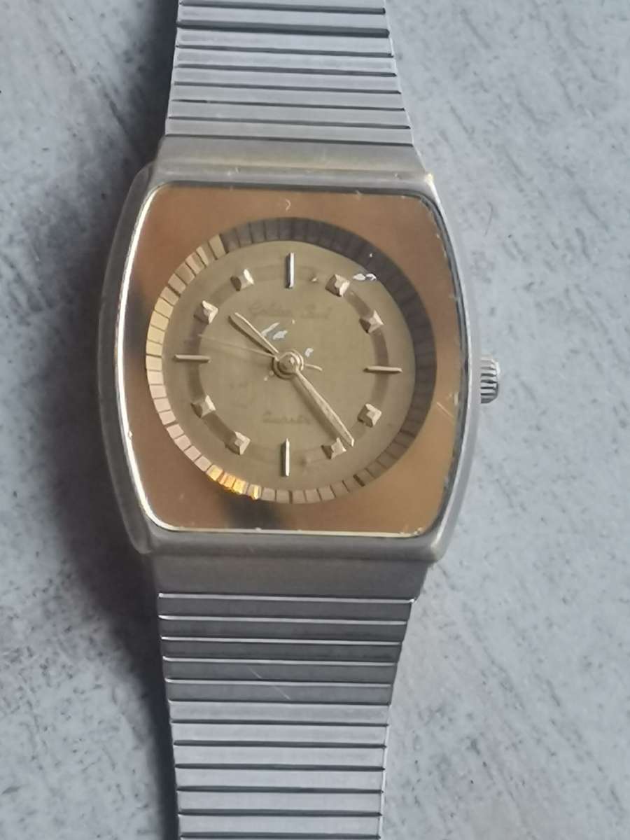 MENS VINTAGE GOLDEN PEARL QUARTZ WATCH IN EXCELLENT WORKING CONDITION