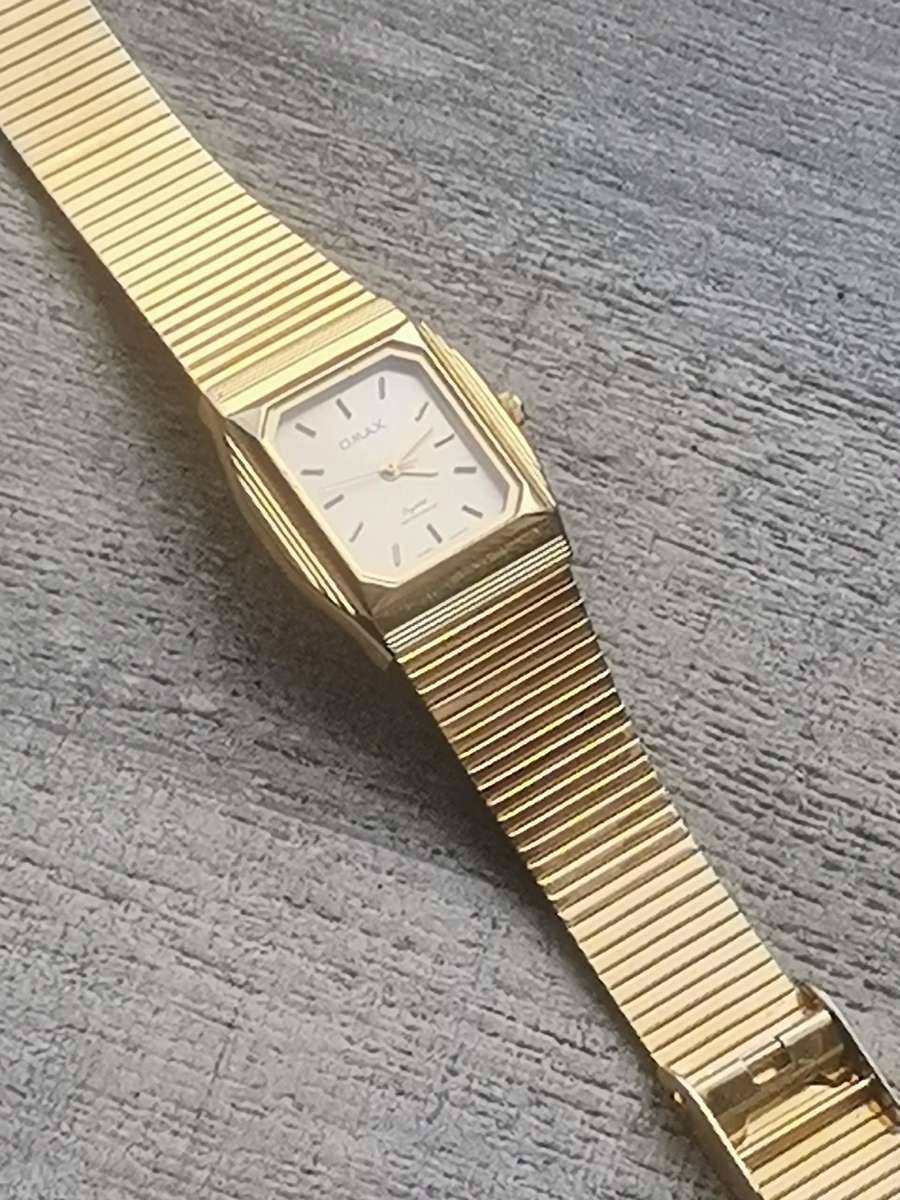 LADIES GOLD OMAX WATCH IN EXCELLENT WORKING CONDITION