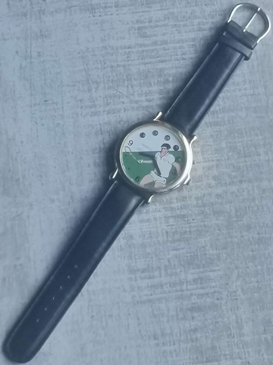 VINTAGE MENS LEGEND TENNIS WATCH WITH FLICKERING COLOURFUL LIGHTS IN EXCELLENT WORKING CONDITION