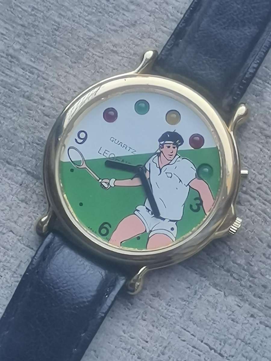 VINTAGE MENS LEGEND TENNIS WATCH WITH FLICKERING COLOURFUL LIGHTS IN EXCELLENT WORKING CONDITION