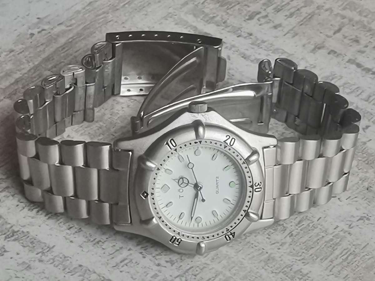 LADIES TORQ STAINLESS STEEL WATCH WITH ROTATING BEZEL IN EXCELLENT WORKING CONDITION