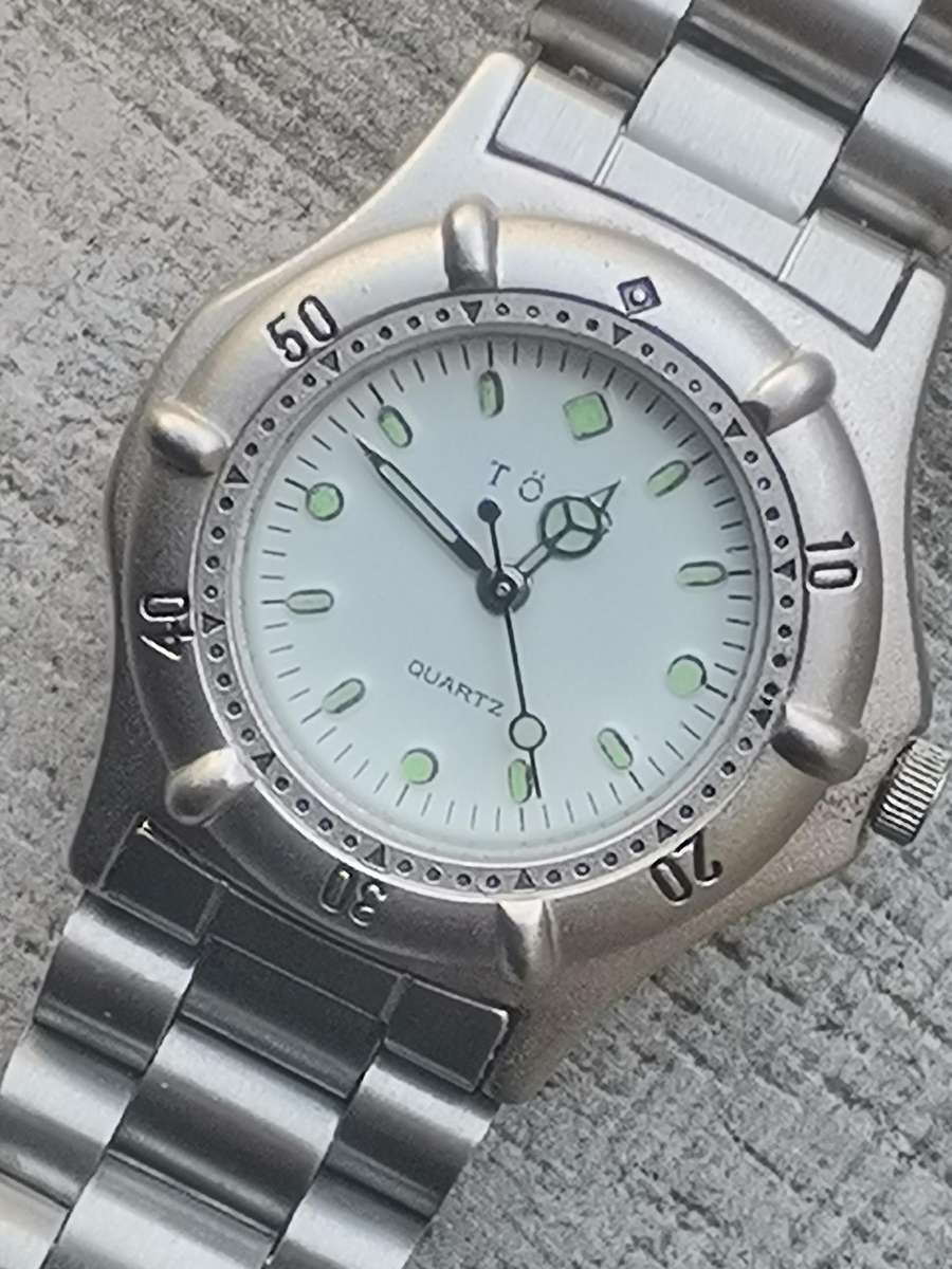 LADIES TORQ STAINLESS STEEL WATCH WITH ROTATING BEZEL IN EXCELLENT WORKING CONDITION