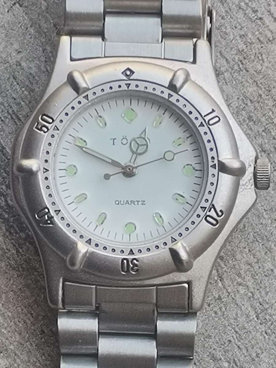 LADIES TORQ STAINLESS STEEL WATCH WITH ROTATING BEZEL IN EXCELLENT WORKING CONDITION